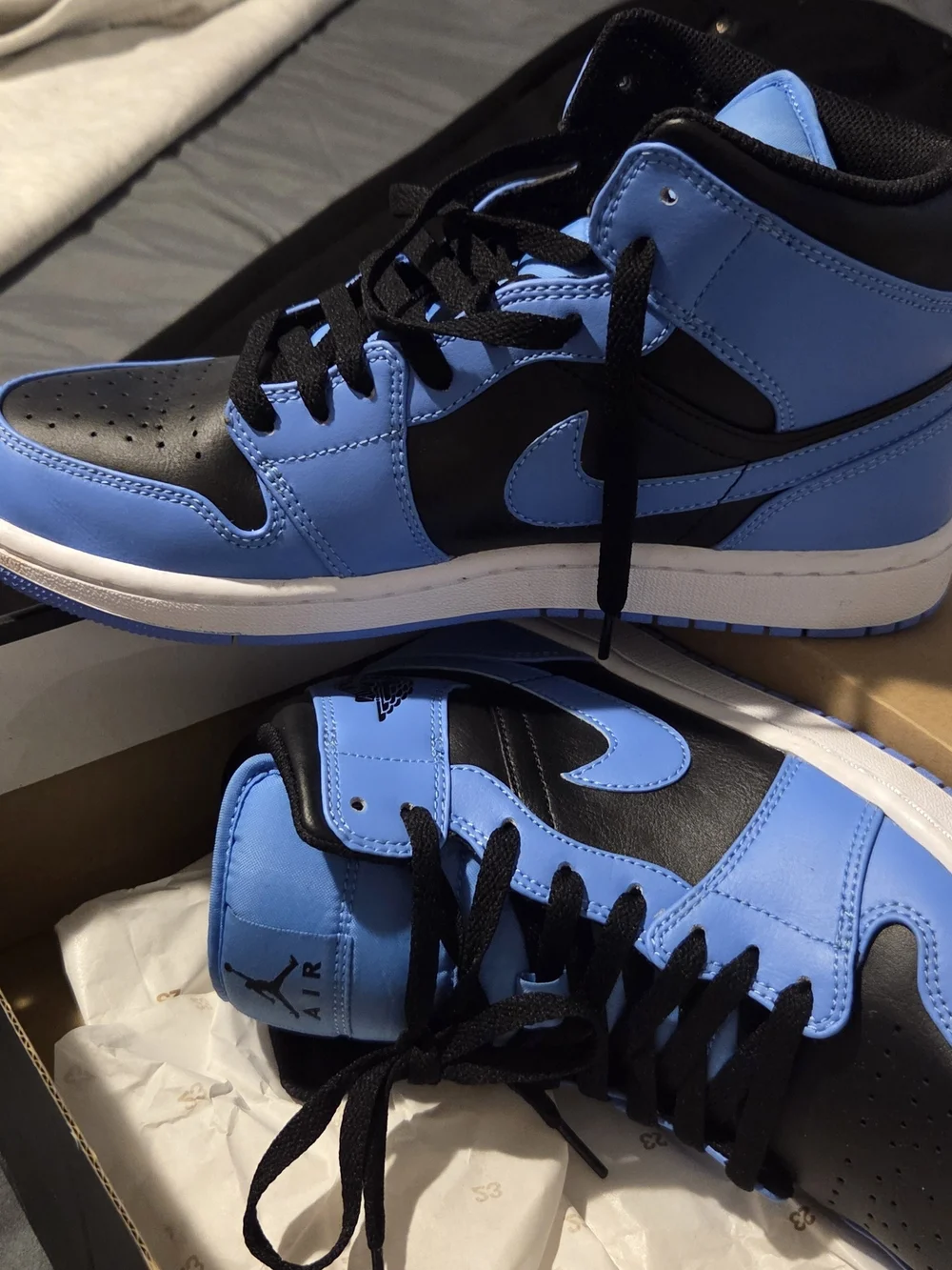 Jordan Men’s Air Jordan 1 Mid Black and University Blue